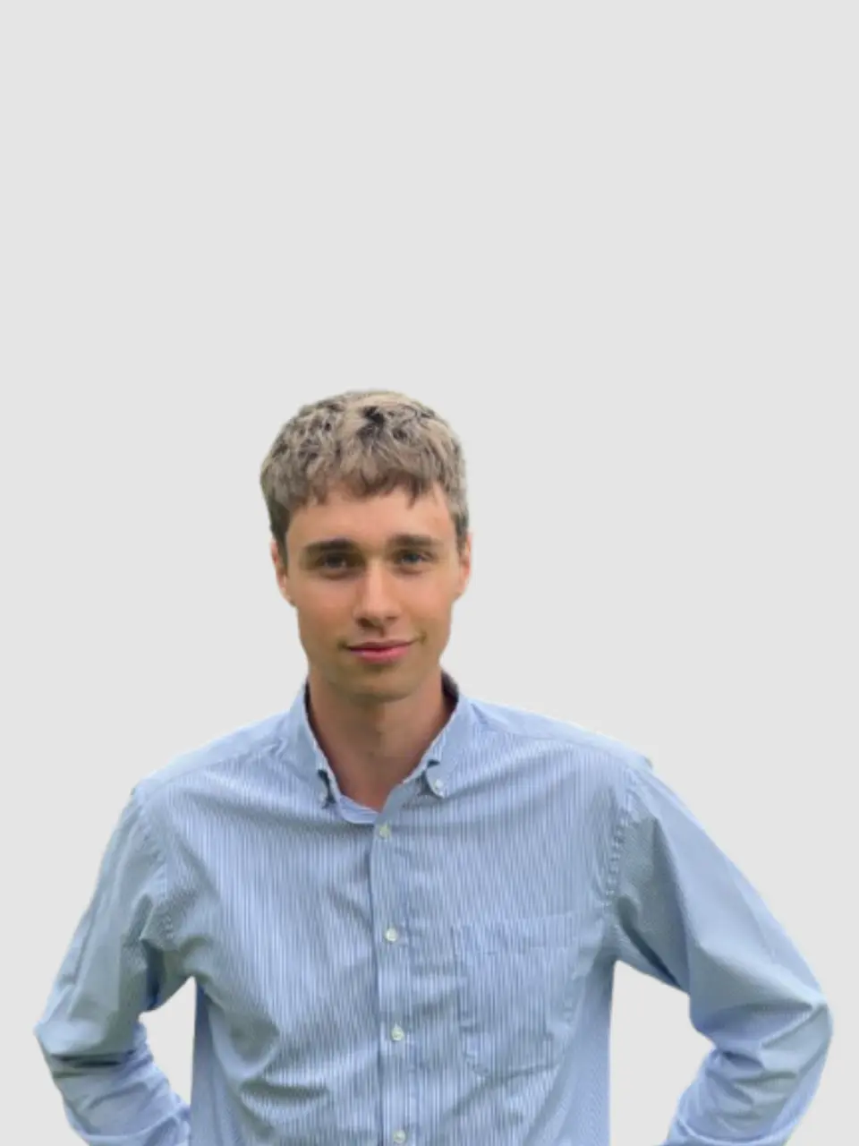 A picture of me on a grey background.